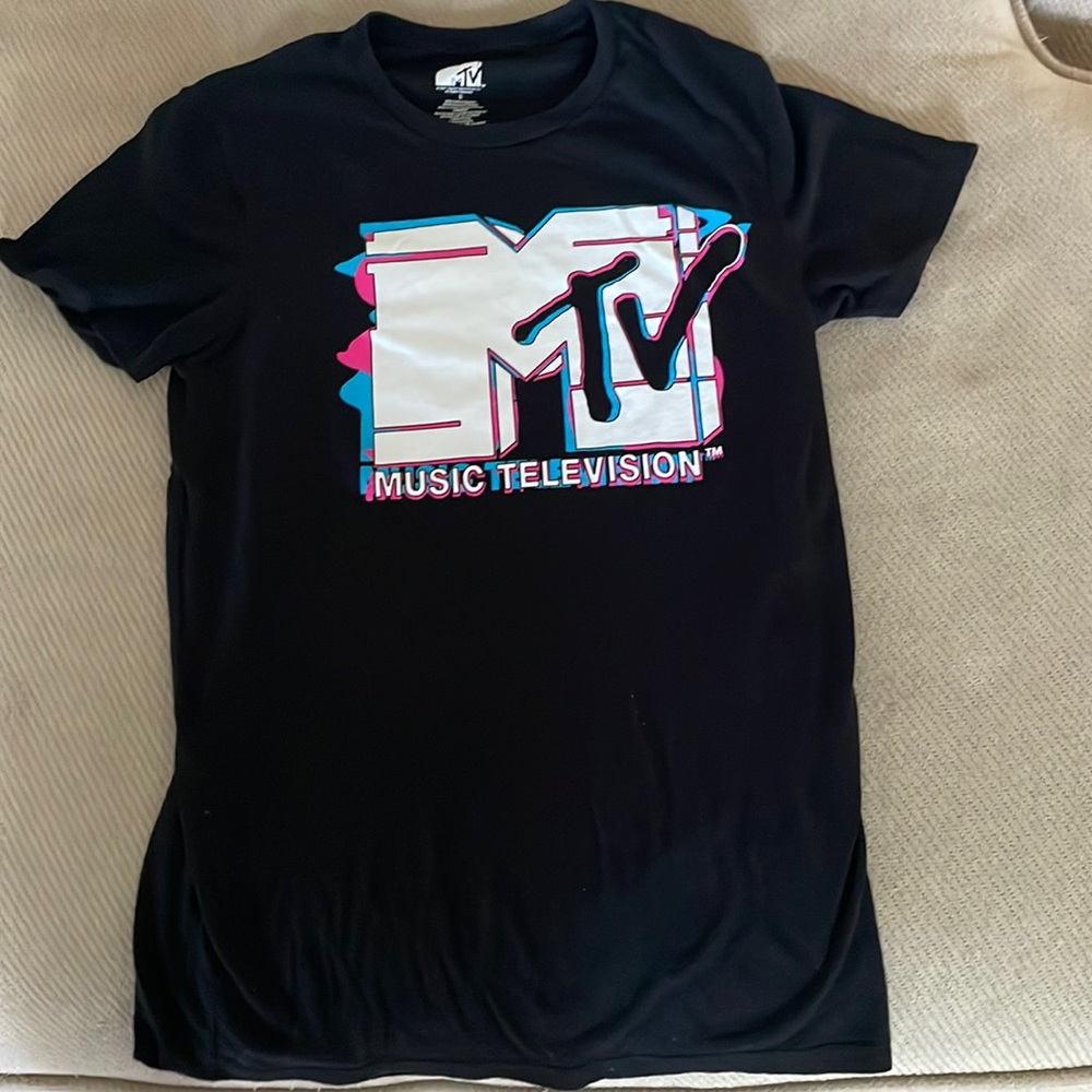 I’m selling a M tv t shirt it’s black pink and blue and white and a size S
